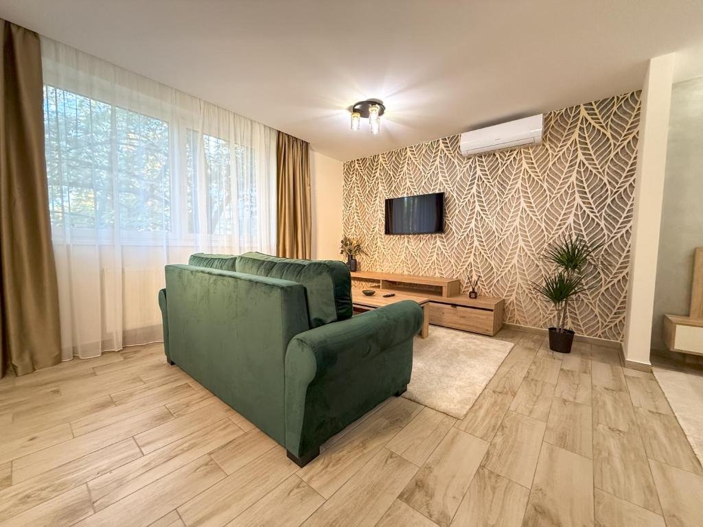 Viola Apartman Classic – nappali kanapéval és TV-vel